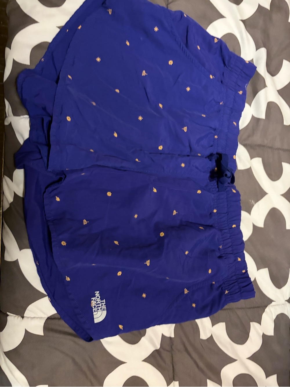The North Face Women’s Royal Blue Athletic Shorts with Gold Dot Print